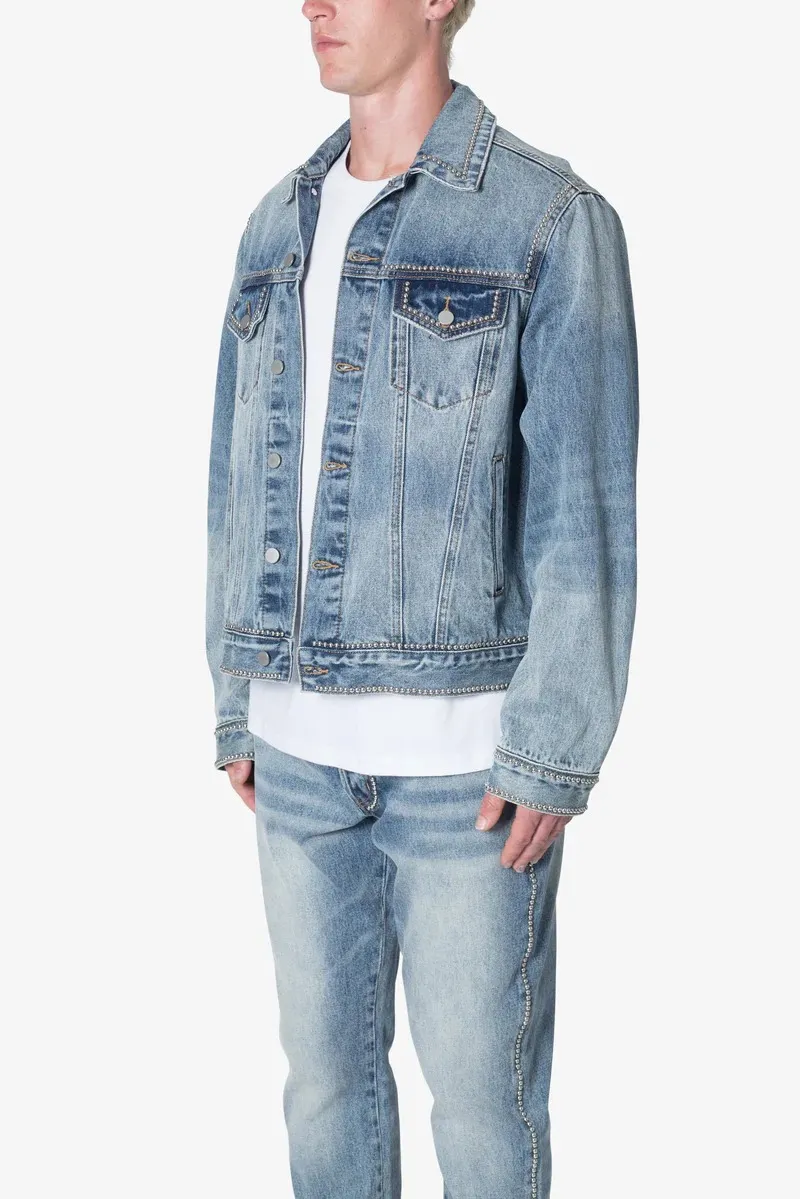 LIGHT BLUE DENIM STUDDED TRUCKER JACKET