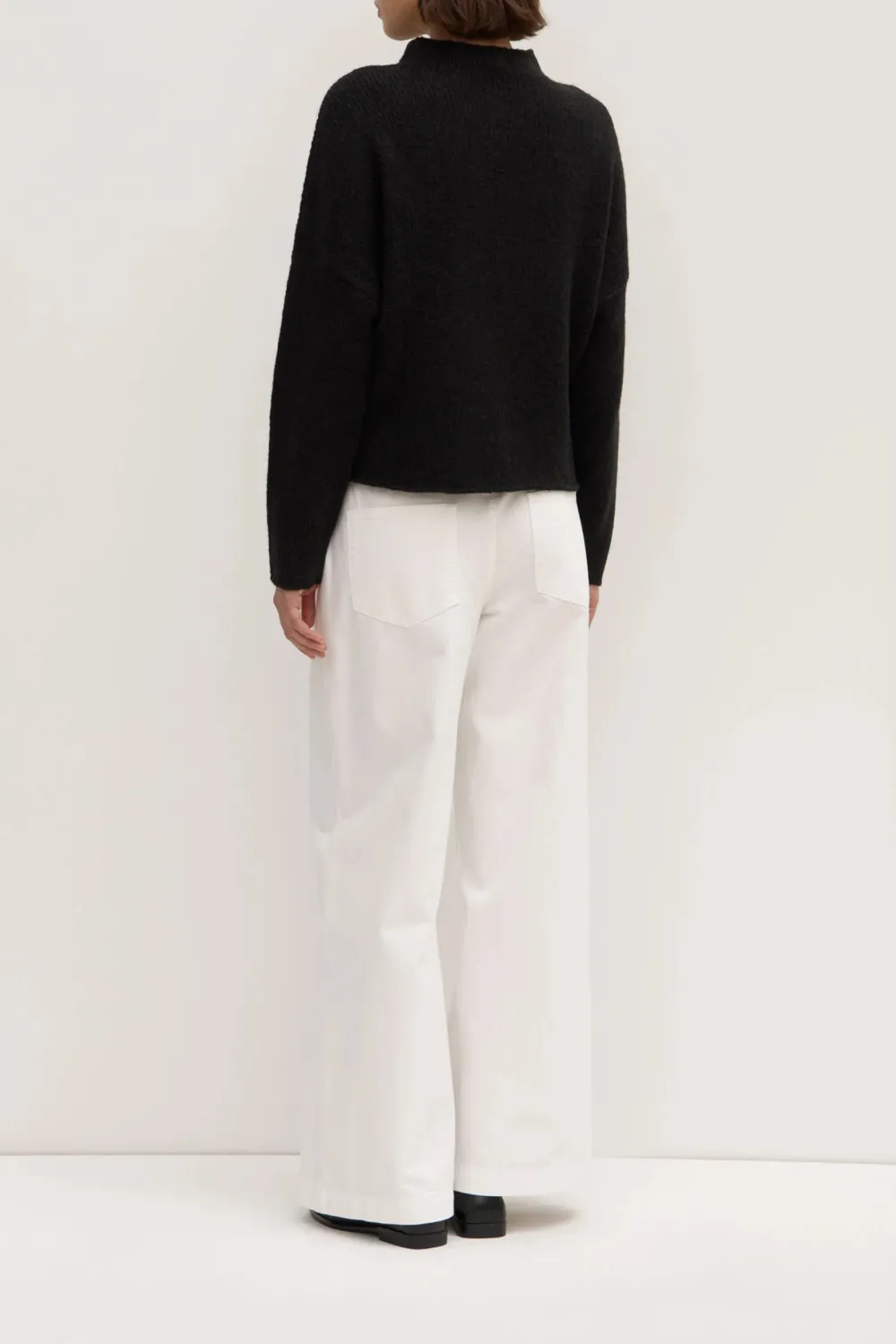 Loose Knit Sweater With Shoulder Drop And Stand Up Collar