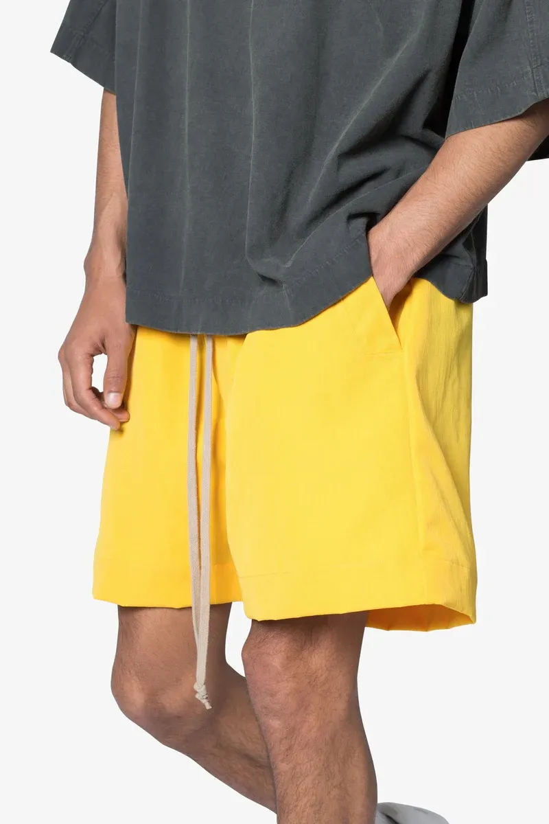 BRIGHT YELLOW ELASTIC WAIST SHORTS