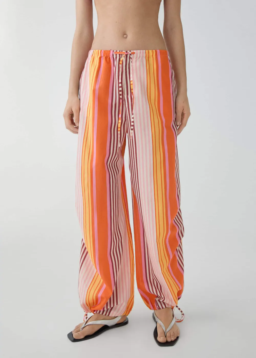 Parachute pants with striped print