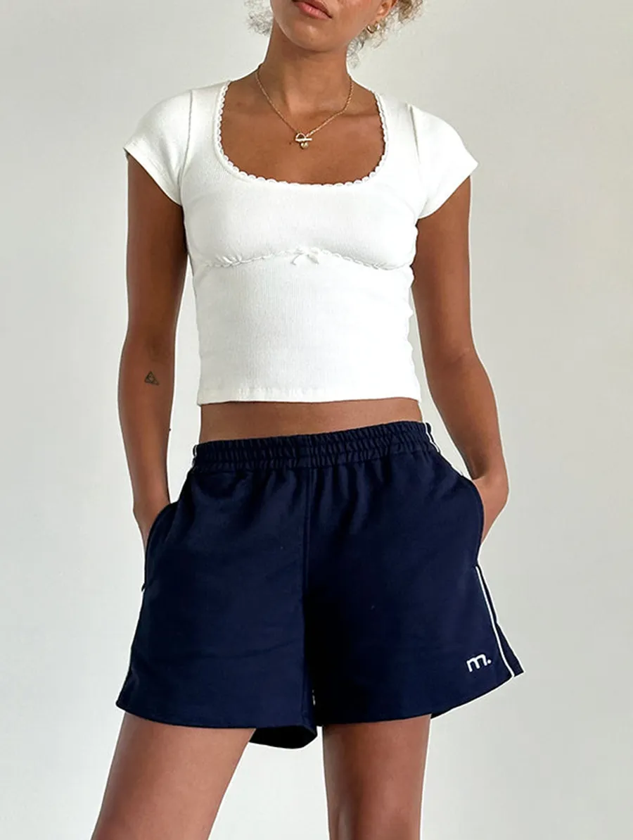 Short In Navy With White Piping With M Emb