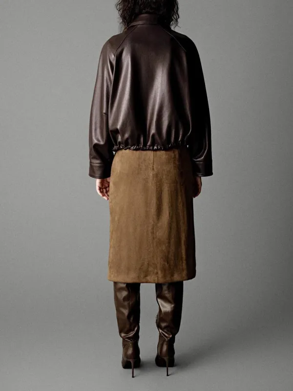 A Casual Brown Leather Jacket With A Large Lapel Hem And Drawstring