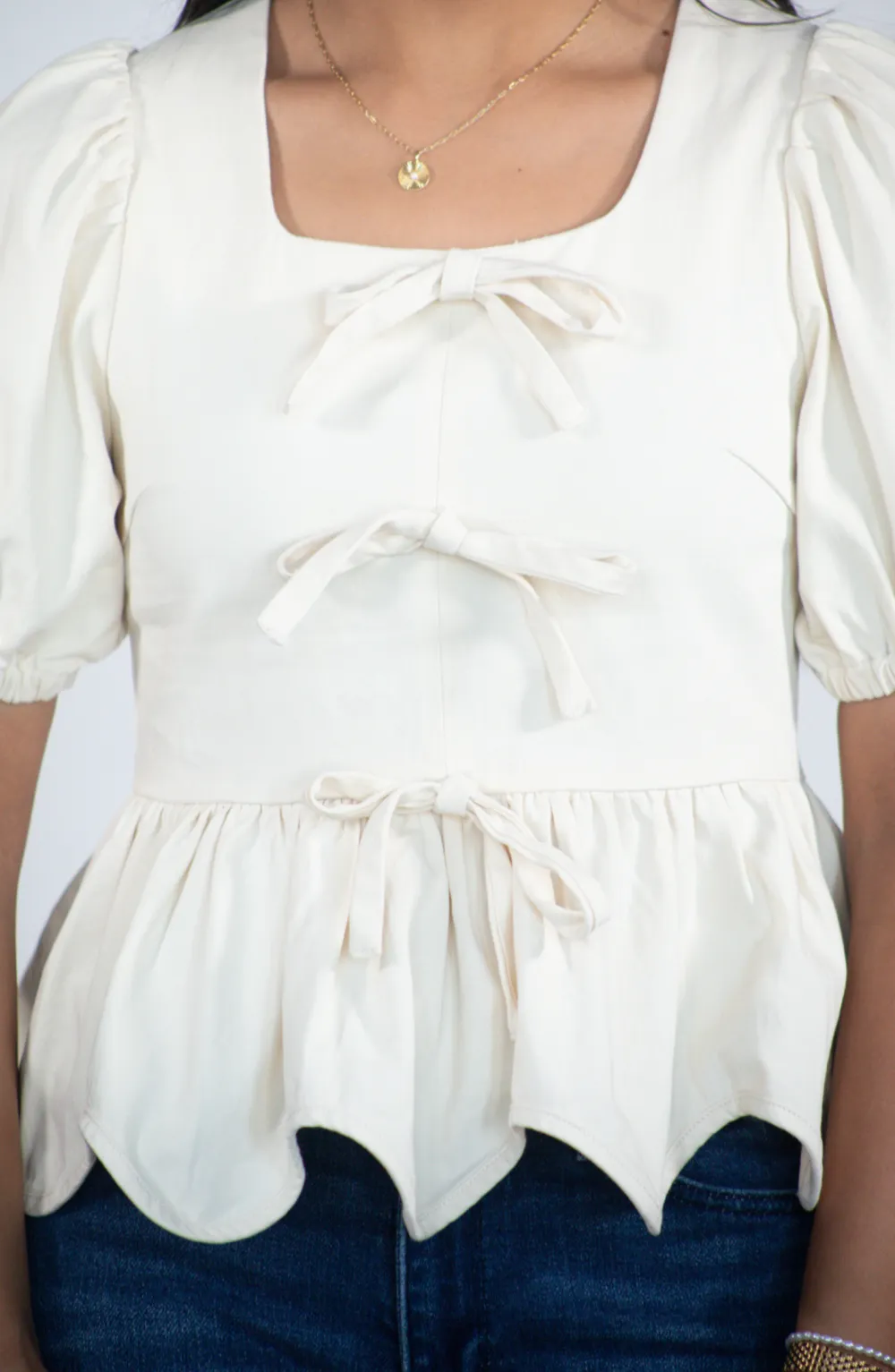 Seek To Amaze Ivory Front Bow Top