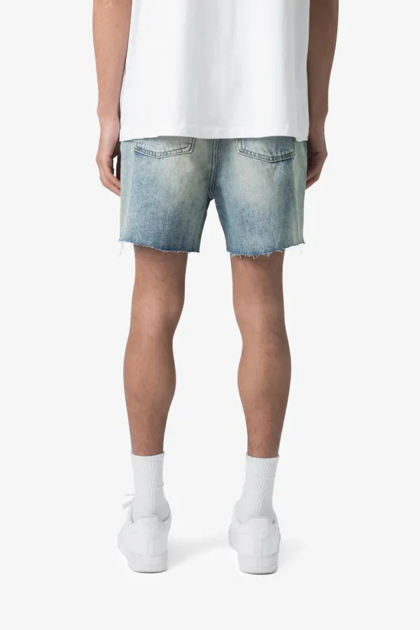 LIGHT BLUE DISTRESSED DENIM SHORTS
