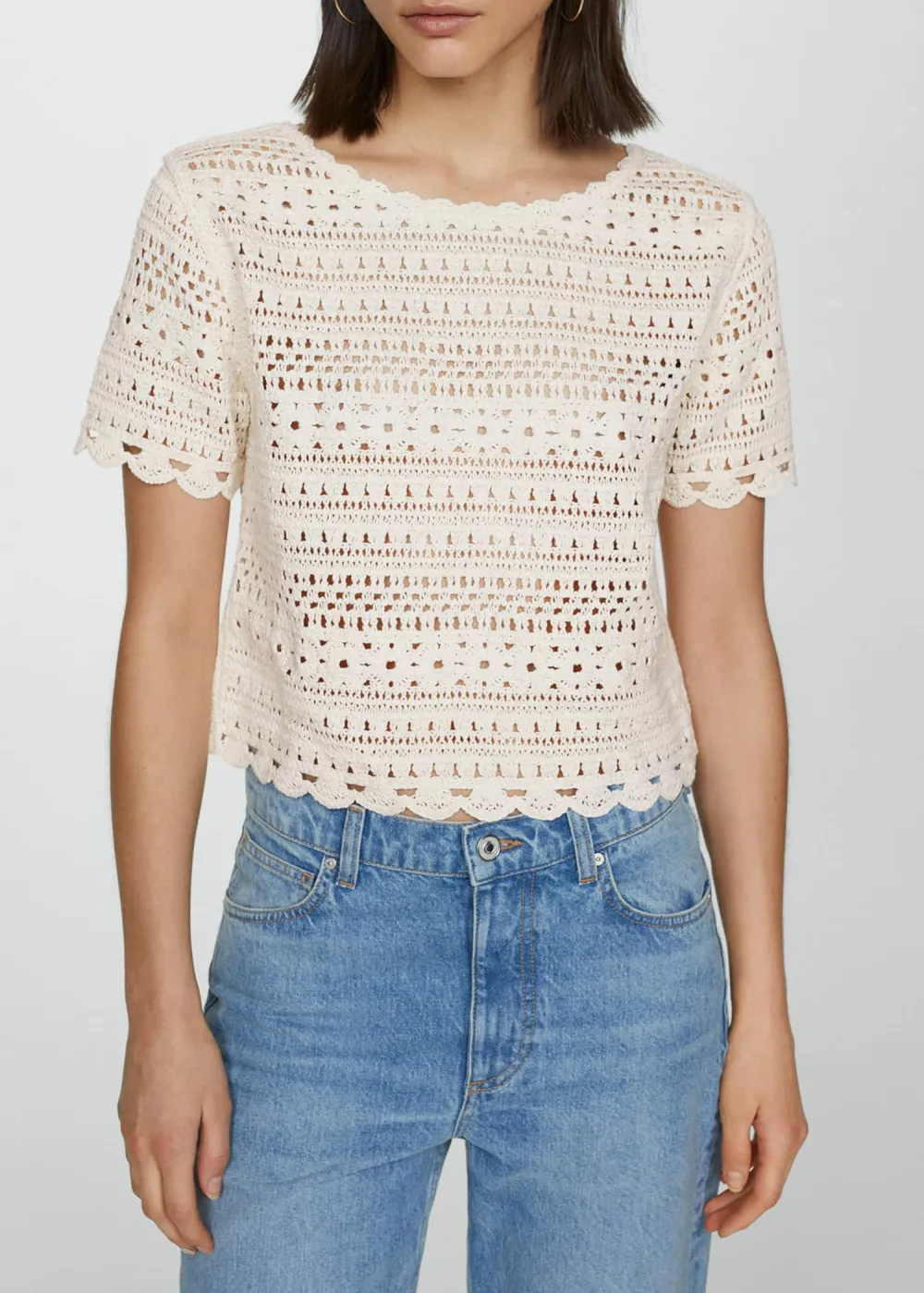 Knitted jumper with openwork details