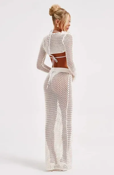 New Seaside Vacation Sunscreen Beach Skirt Sexy Hollow See-Through Long-Sleeved Knitted Suit