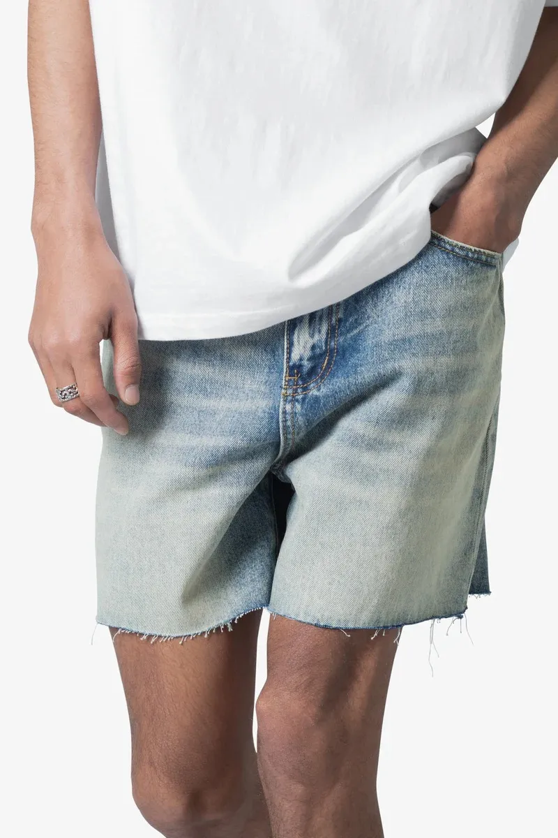 LIGHT BLUE DISTRESSED DENIM SHORTS