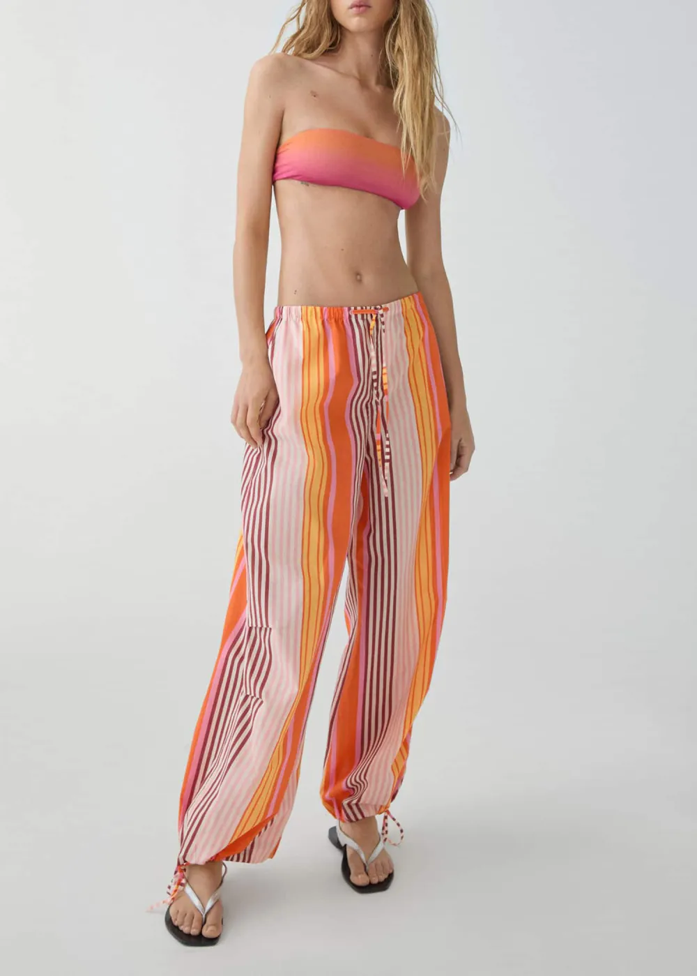 Parachute pants with striped print