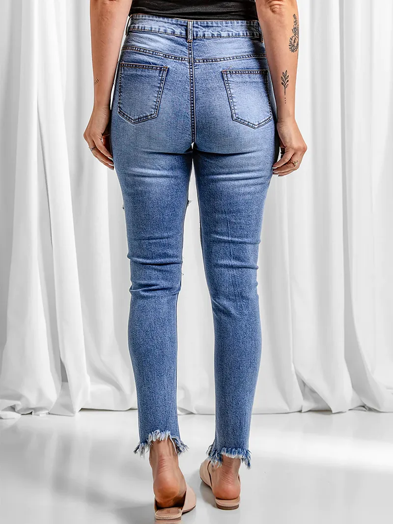 Women's ripped slim fit mid-rise jeans