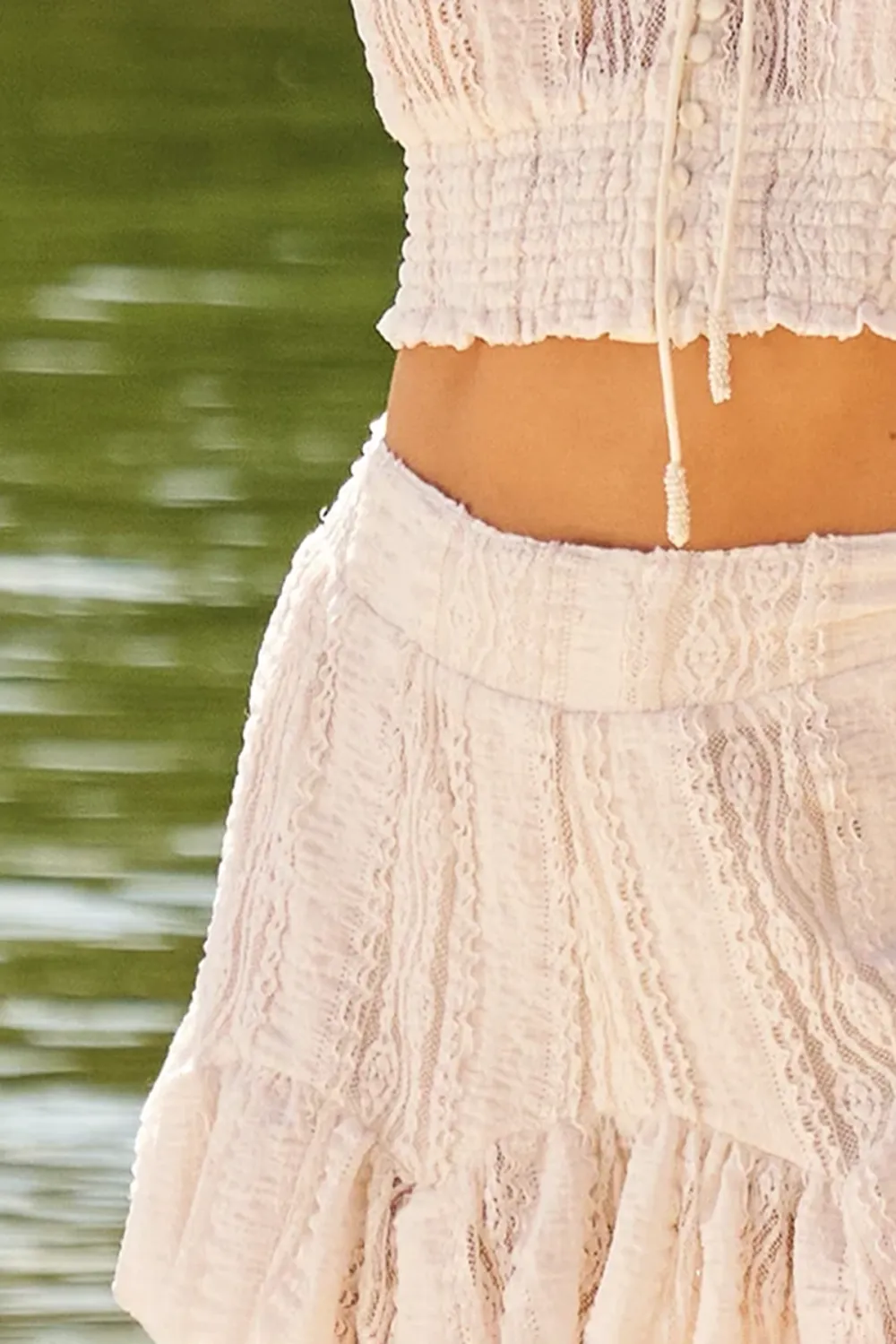 Off White Smocked Waist Ruffled Shorts