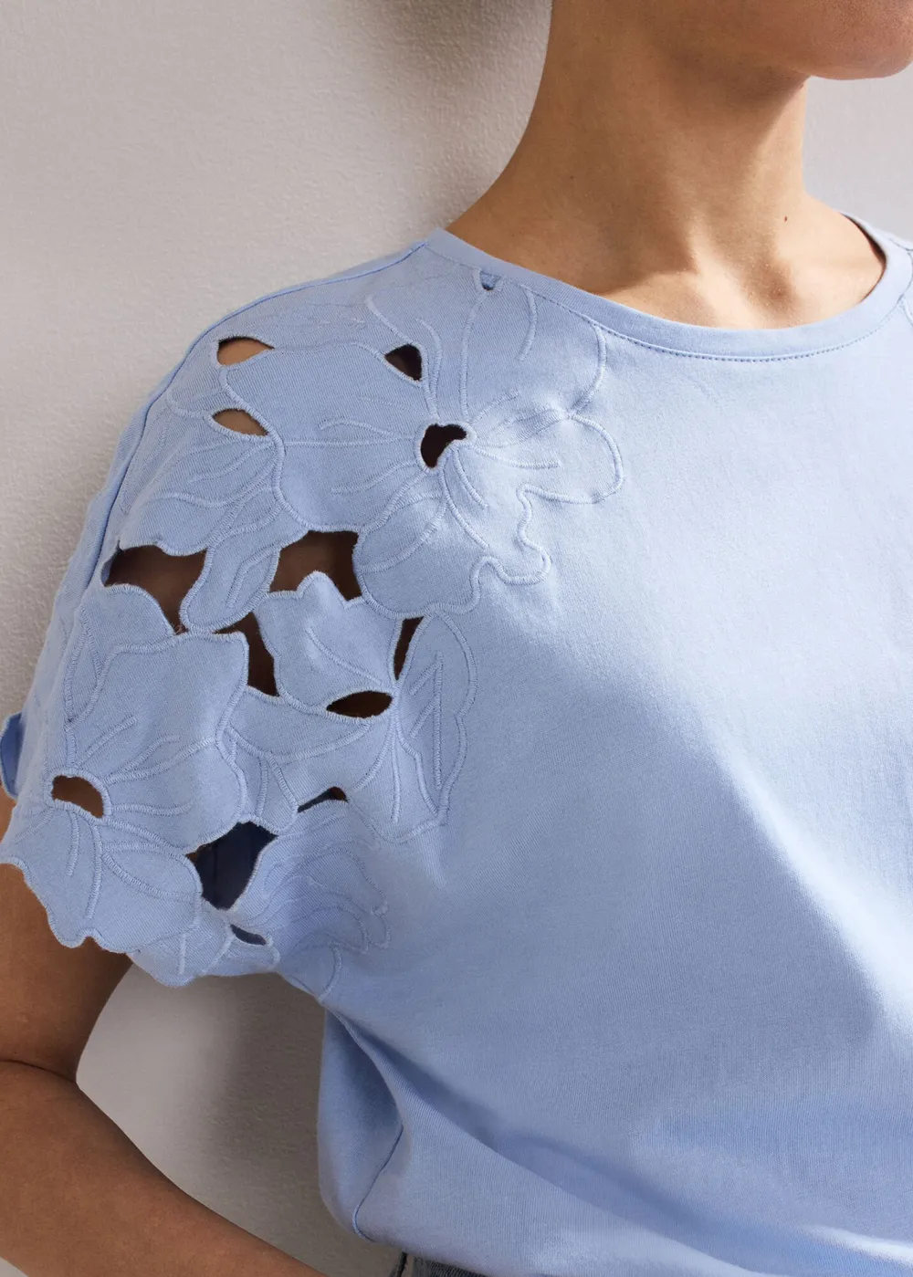 Artistic Design Round Neck Hollow Solid Color Top