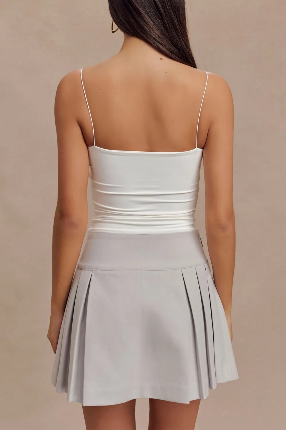 Pleated Buckle Mini Skirt