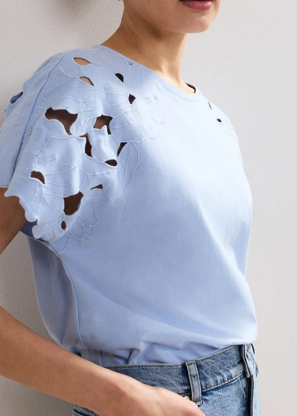 Artistic Design Round Neck Hollow Solid Color Top