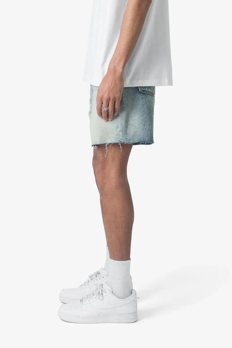 LIGHT BLUE DISTRESSED DENIM SHORTS