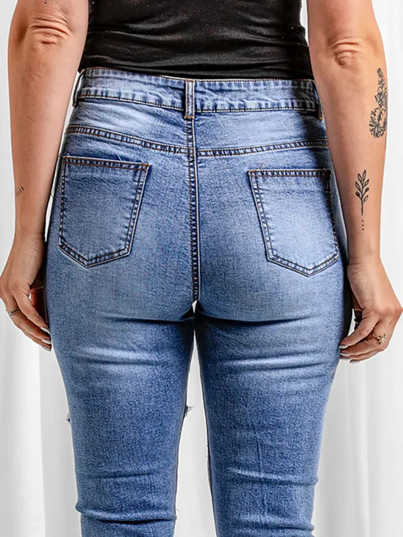 Women's ripped slim fit mid-rise jeans