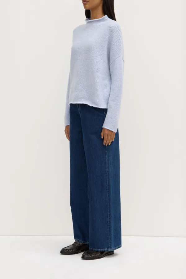 Loose Knit Sweater With Shoulder Drop And Stand Up Collar