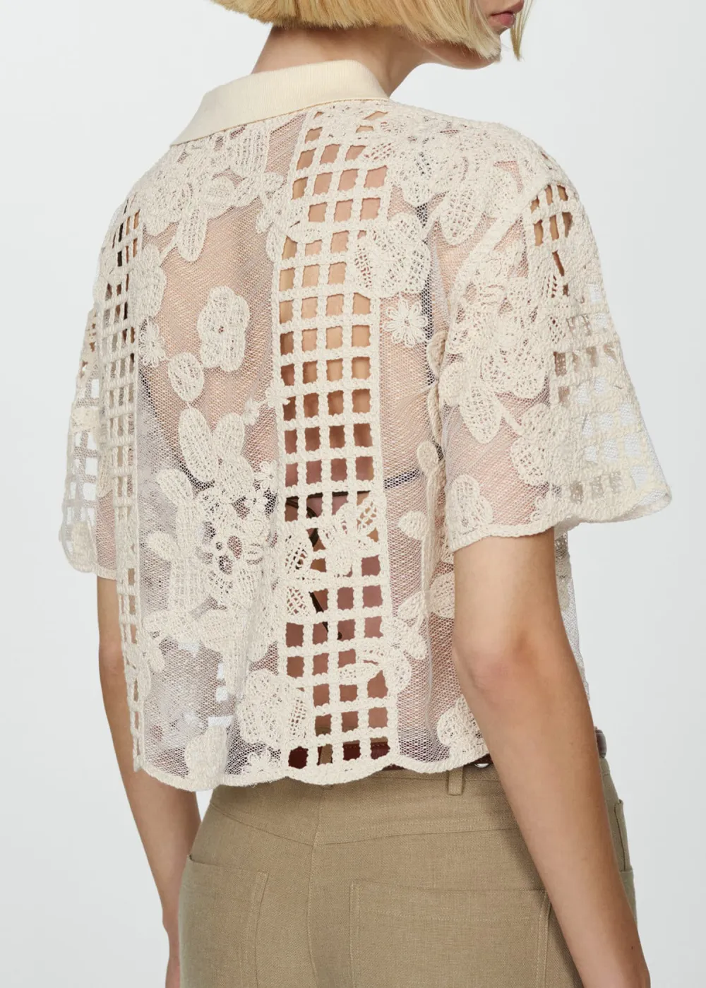 Embroidered blouse with openwork details