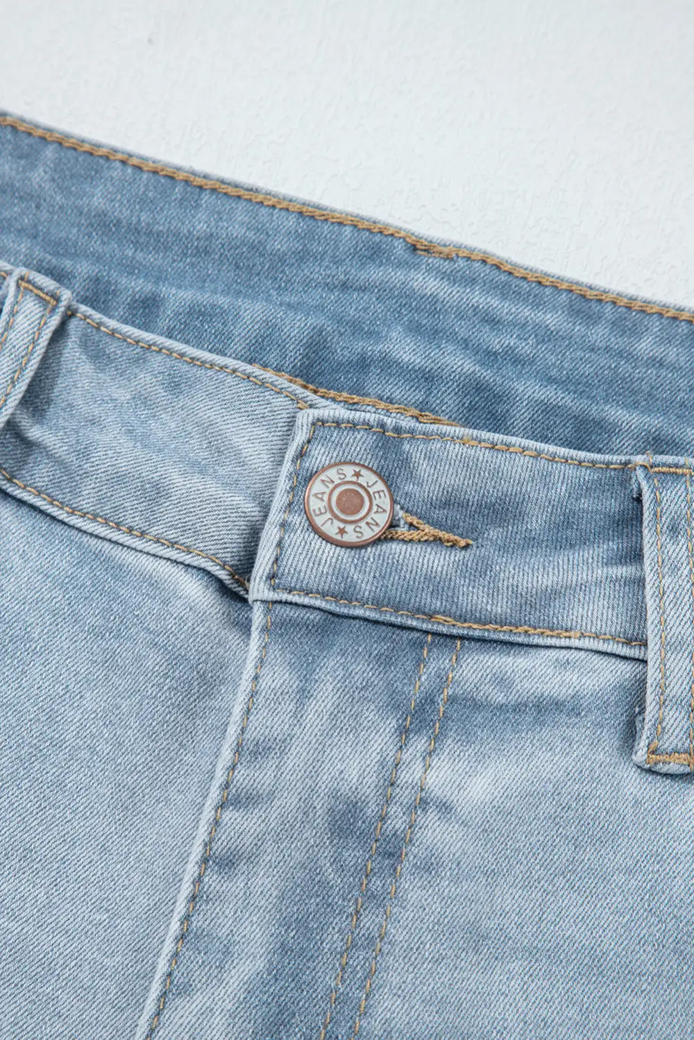Mid Rise Ankle Length Distressed Skinny Jeans