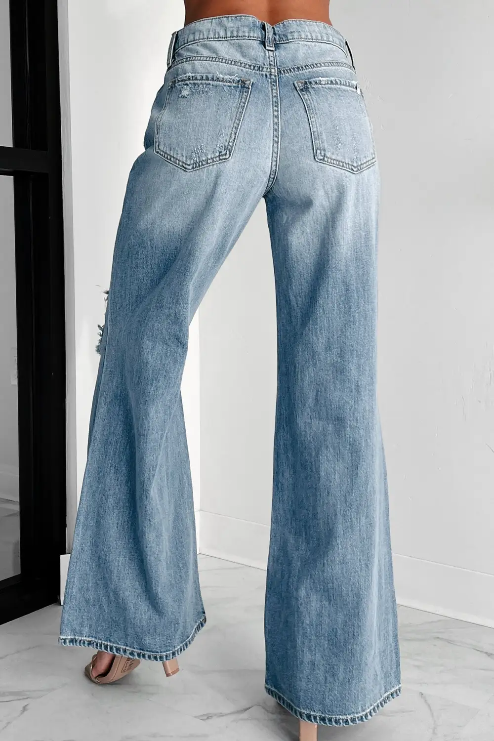 High Rise Distressed Wide Leg Sneak Peek Jeans
