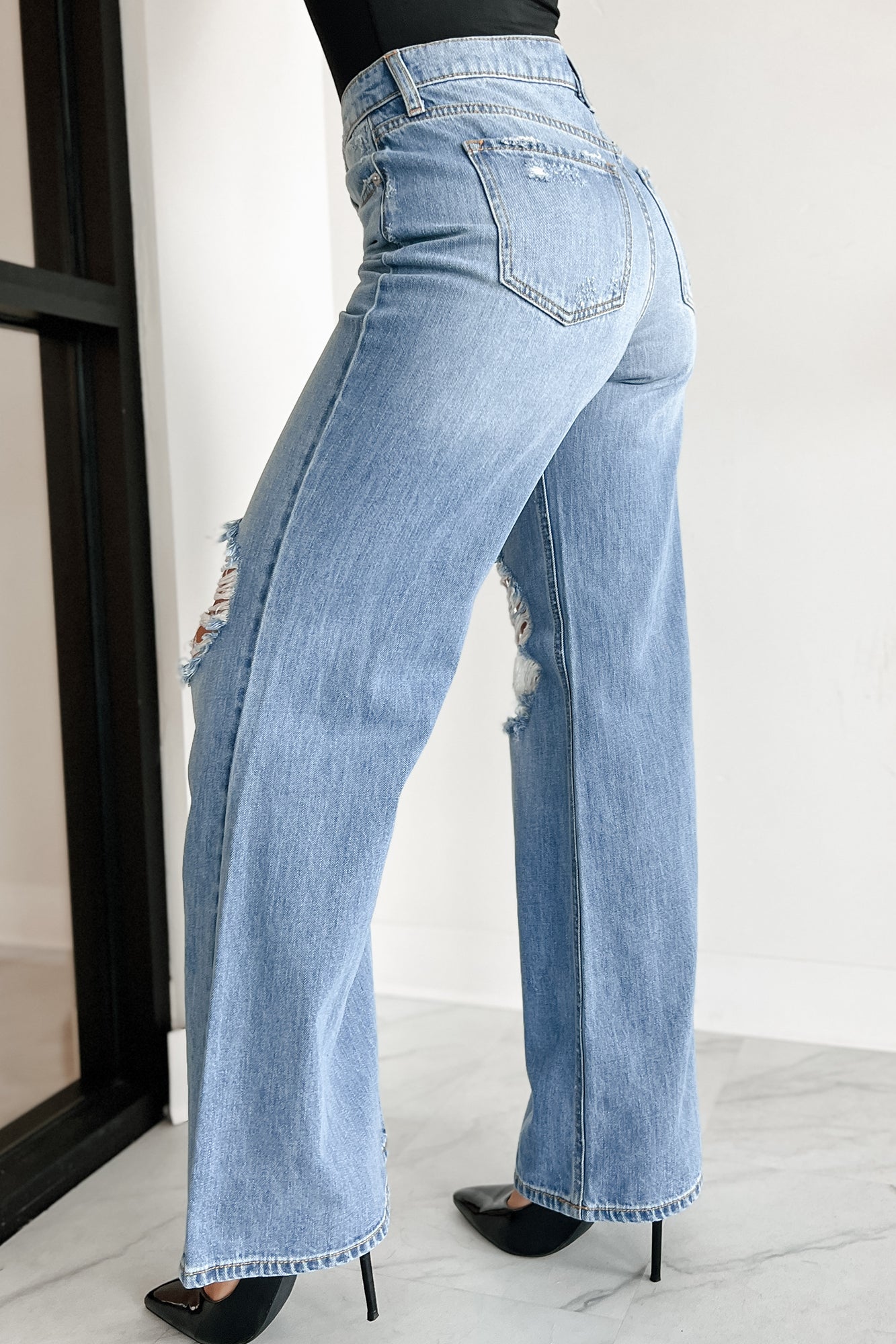 Kyra High Rise Distressed Wide Leg Sneak Peek Jeans