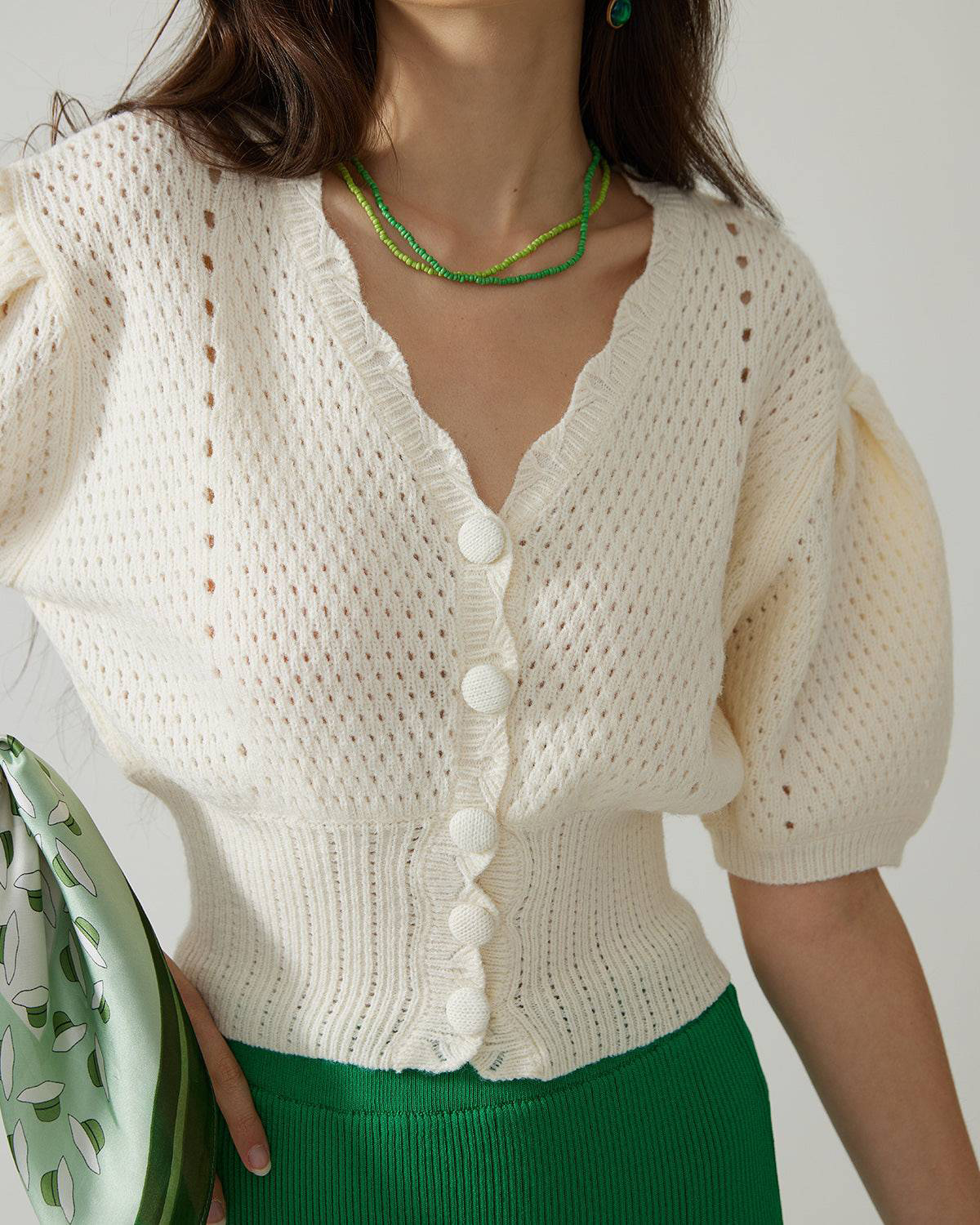 The Short-Sleeve Cutout Knitted Top