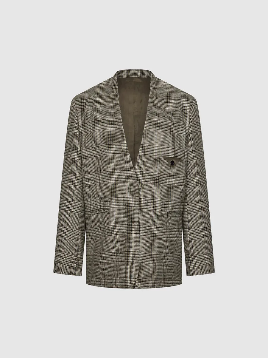 A Long Loose Coat In A British Style With A Checkered Suit For Women