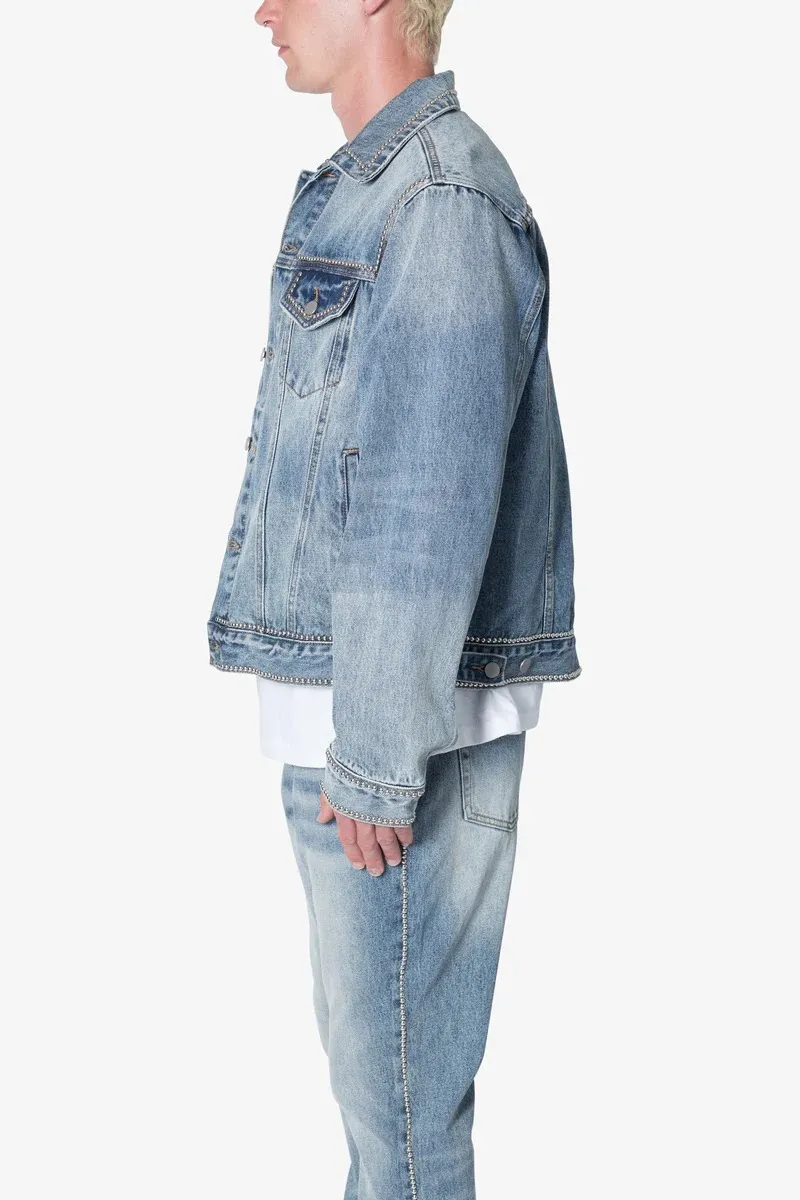 LIGHT BLUE DENIM STUDDED TRUCKER JACKET