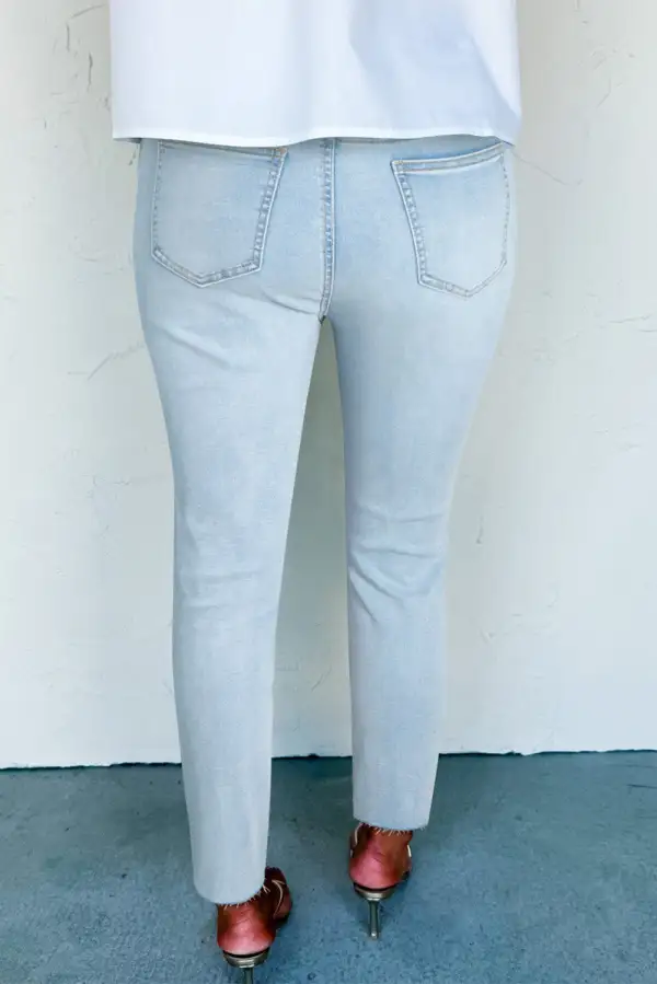 Mid Rise Ankle Length Distressed Skinny Jeans