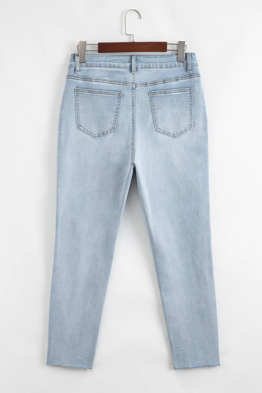 Mid Rise Ankle Length Distressed Skinny Jeans