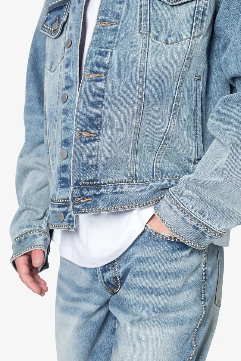 LIGHT BLUE DENIM STUDDED TRUCKER JACKET