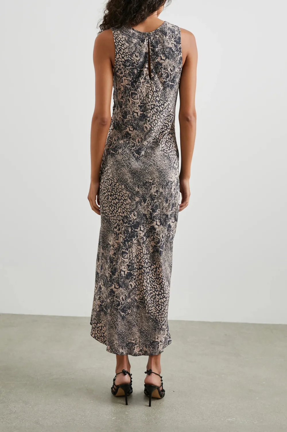 A Pleated Color-Block Dress With An Asymmetrical Side Waist Design
