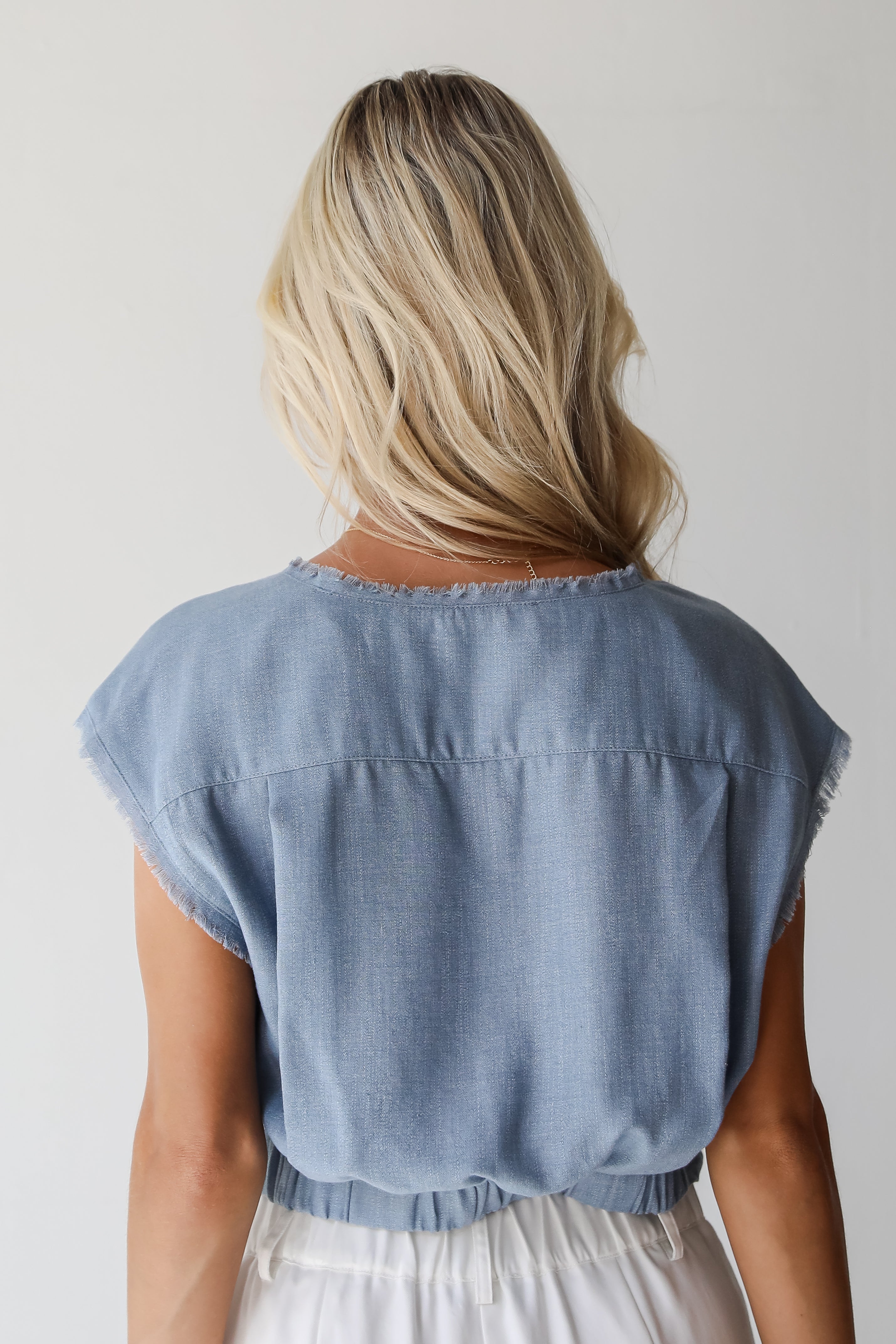 Sweet Position Denim Surplice Blouse