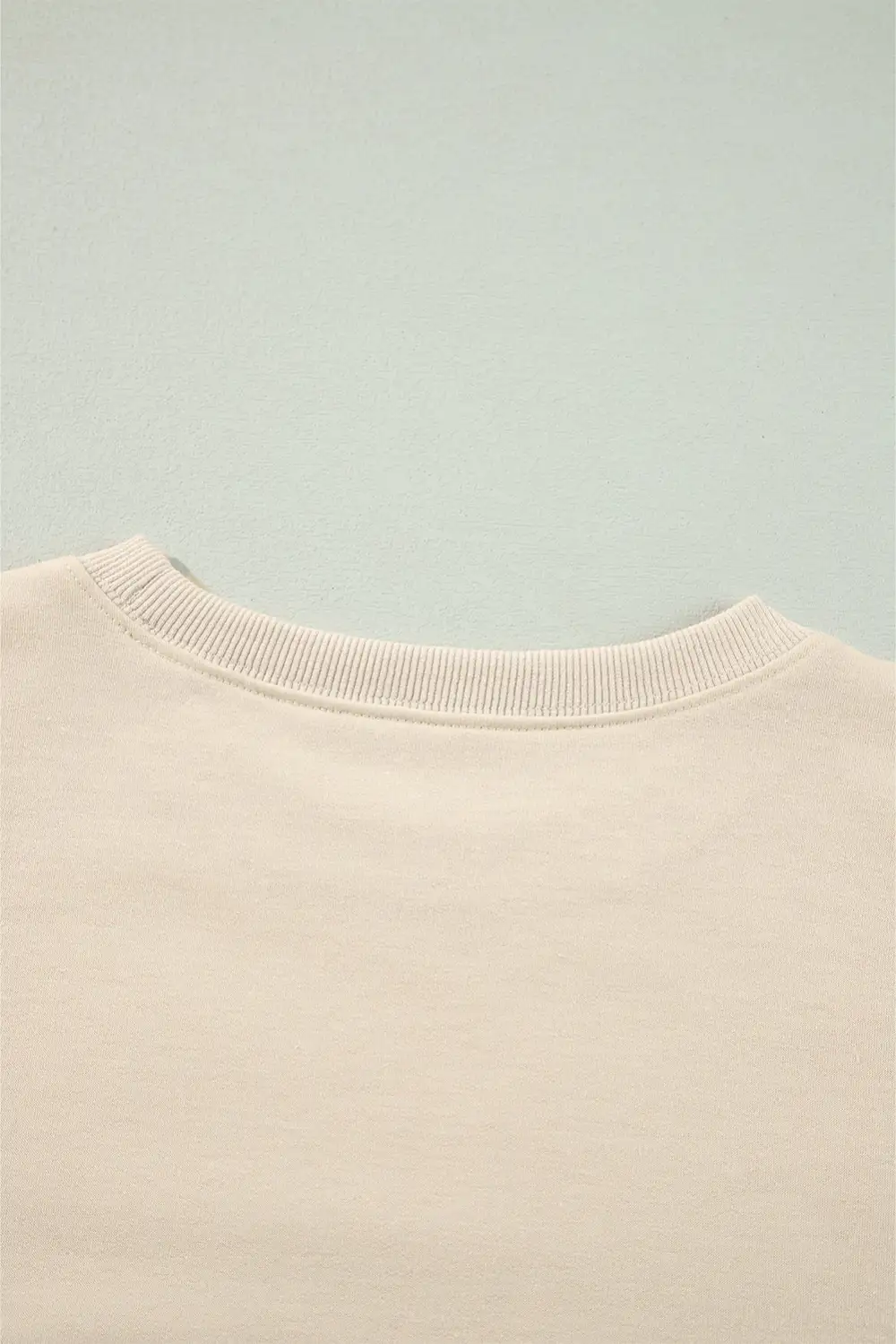 Jet Stream Solid Color Ruffled Shoulder Long Sleeve Blouse