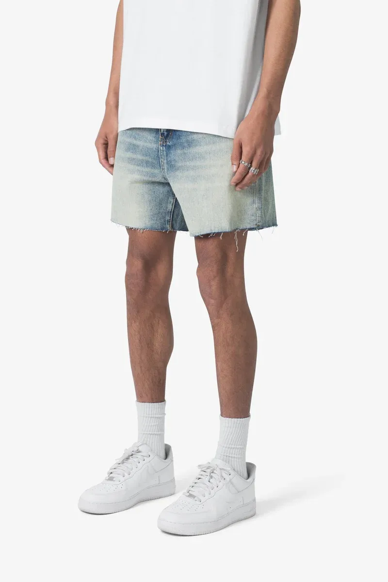 LIGHT BLUE DISTRESSED DENIM SHORTS