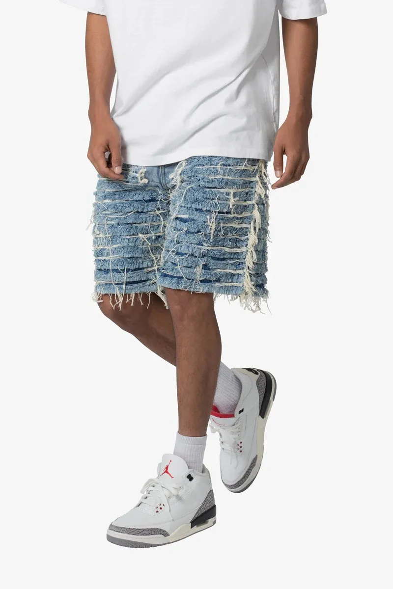 LIGHT BLUE ALL OVER DISTRESSED DENIM SHORTS
