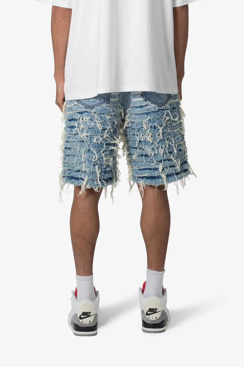 LIGHT BLUE ALL OVER DISTRESSED DENIM SHORTS