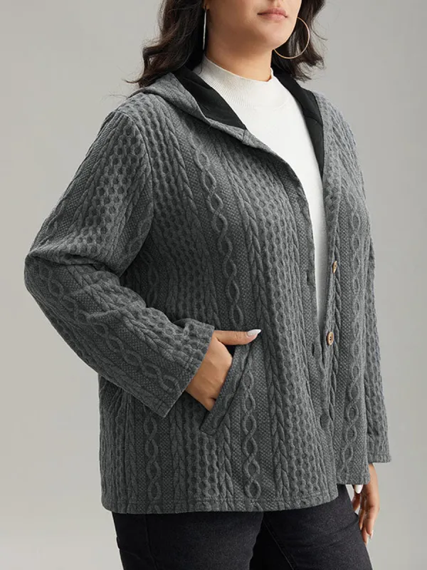 The gray textured jacket has pockets