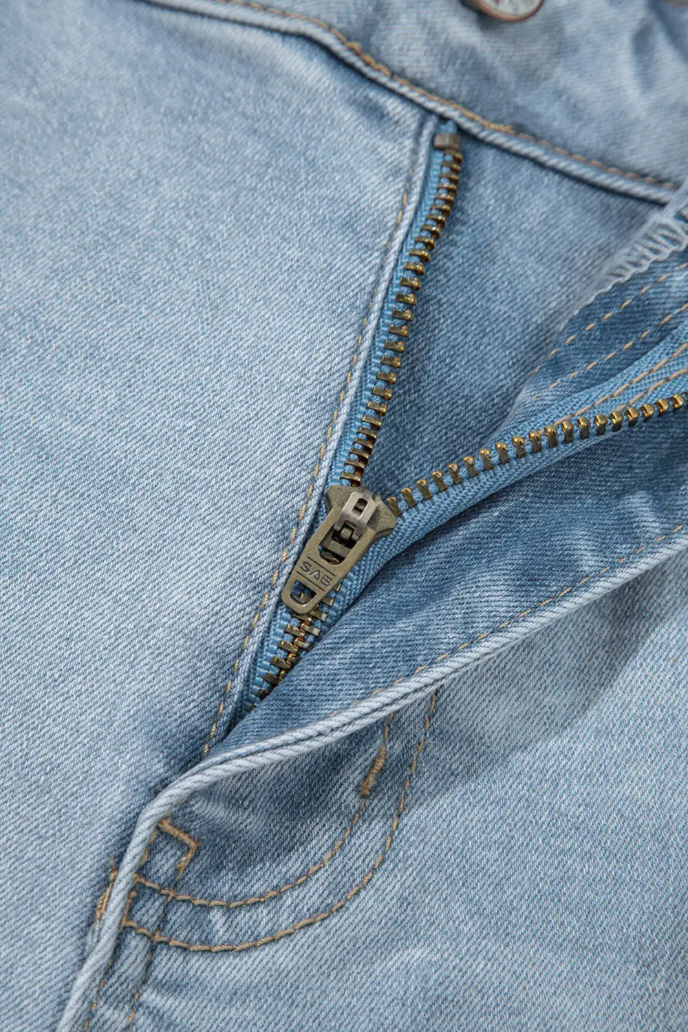 Mid Rise Ankle Length Distressed Skinny Jeans