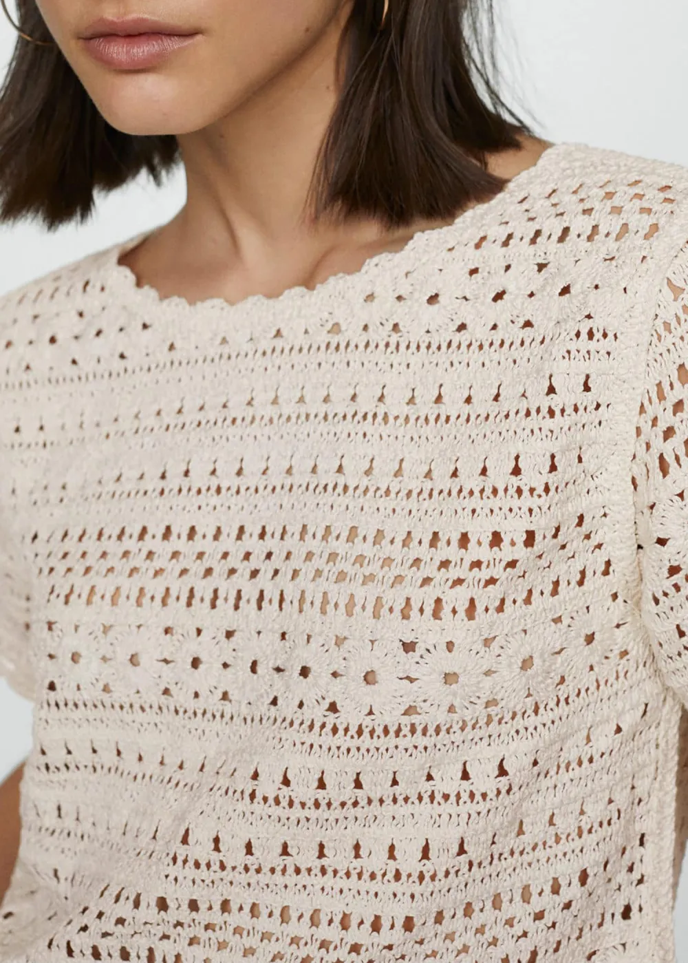 Knitted jumper with openwork details