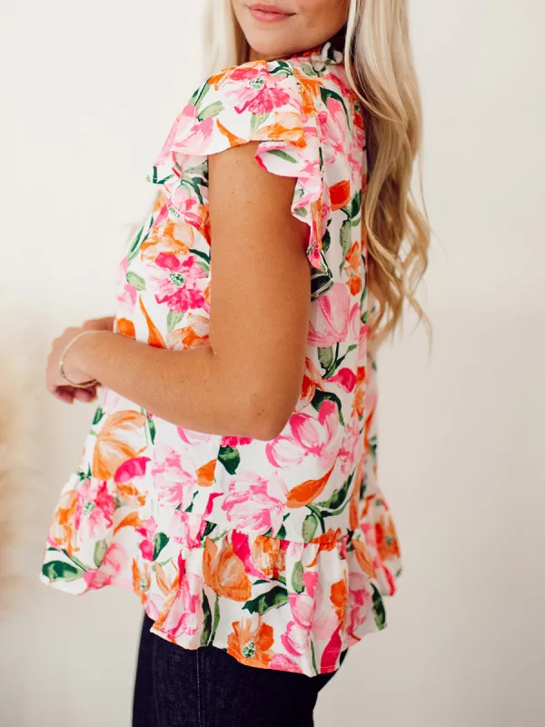 Pink and orange floral pattern pleated top