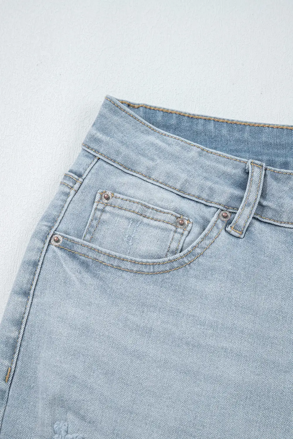 Mid Rise Ankle Length Distressed Skinny Jeans