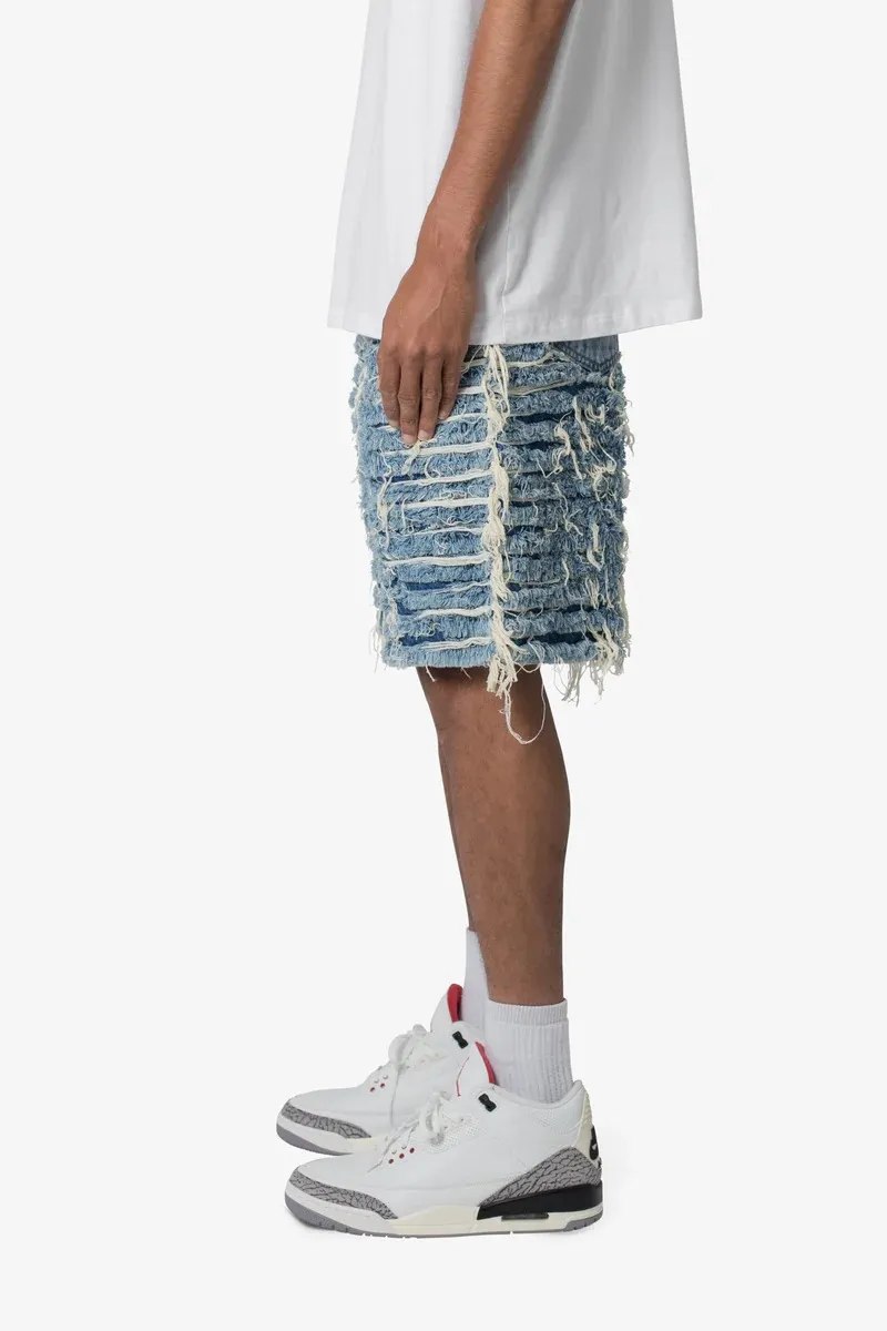 LIGHT BLUE ALL OVER DISTRESSED DENIM SHORTS