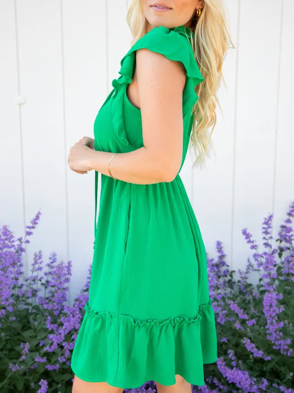 Green ruffled sleeve mini dress